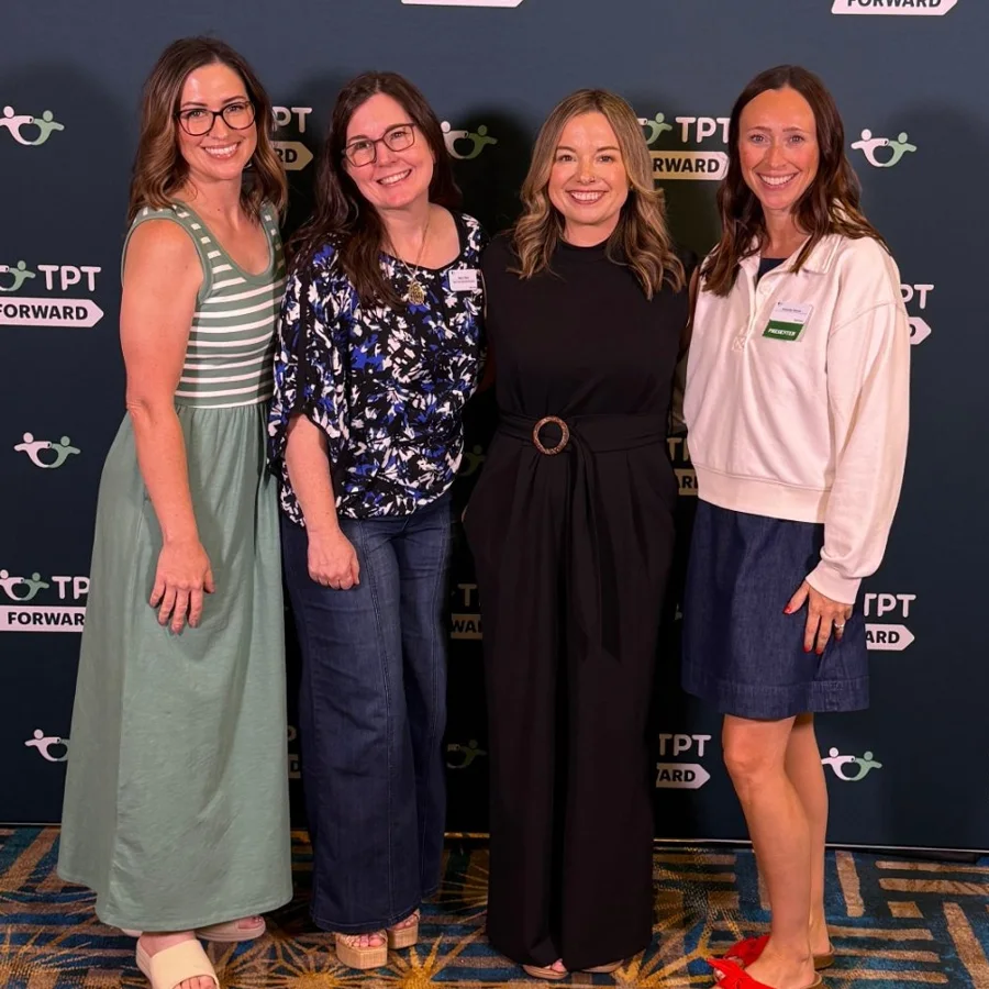 Four TPT sellers smiling together at TPT Forward